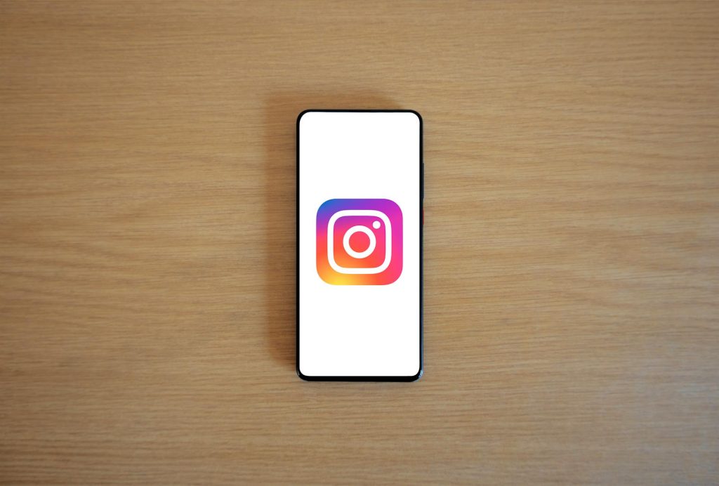 Logo Instagram formats, téléchargement et — logo Instagram sur écran de smartphone